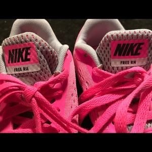Nike pink girls running/tennis or tumble shoes.